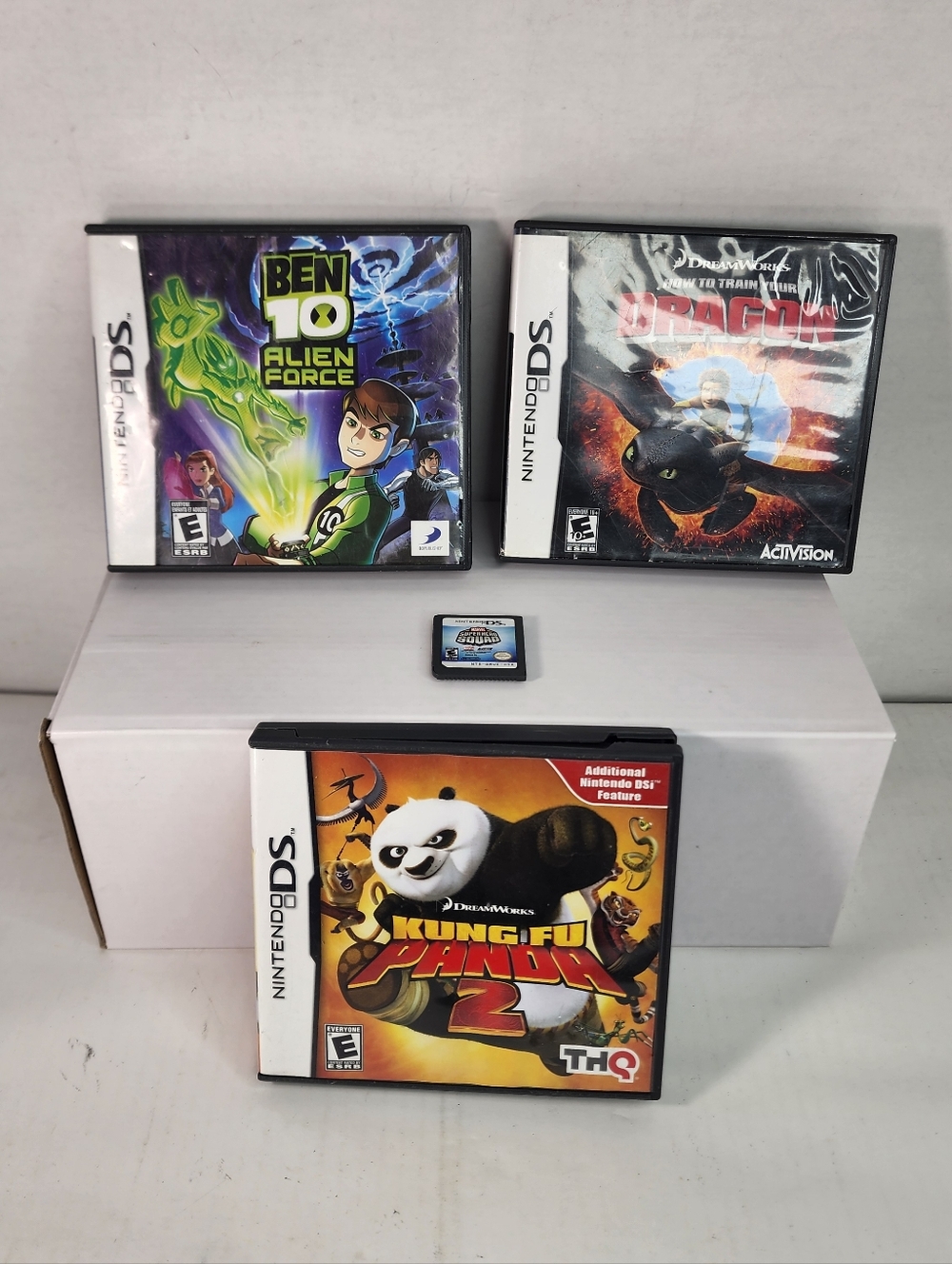 Nintendo DS Game Set ( HT Train Your  Dragon, Ben 10, Kungfu Panda, Super Hero)